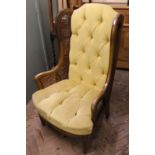 An early 20th Century French style gold upholstered button back chair