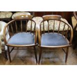 A pair of late Edwardian beech and elm chairs, marked W.E.