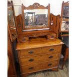 An Edwardian satinwood dressing chest