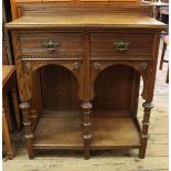 A pitch pine Arts and Crafts two drawer hall table