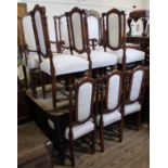 A set of ten 19th Century French dining chairs including two carvers