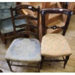 An oak ladderback chair and a Victorian mahogany dining chair