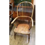 An early 19th Century country made ash and elm Windsor armchair