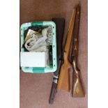 A collection of gun related items including stocks, dies (.