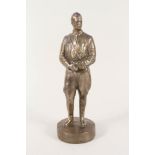 A brass figure of Adolf Hilter,