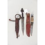 Three various knives including a Jambya