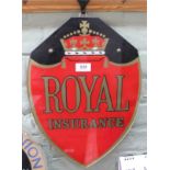 A glass Royal Insurance plaque