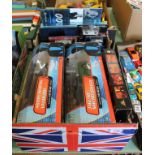 Boxed 007 themed items including radio controlled Aston Martin Vanquish and Jaguar XKR