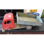 A Leeway Toys tin plate tipper truck,