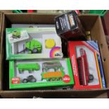 Various boxed models trucks and agricultural including Atlas, Universal Hobbies, Siku,