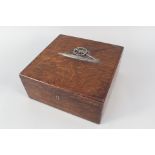 An oak lockable box with sectioned interior and bearing 'white metal' Royal Artillery emblem to lid