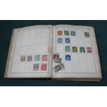 A Lincoln stamp album containing older stamps