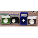 Four cased silver coins, New Zealand dollars,