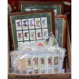 Three frames of Players cigarette cards plus cigarette and trade cards in sleeves