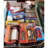 Various boxed commercial vehicles and cars including Corgi,