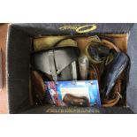 An assortment of holsters, belts,