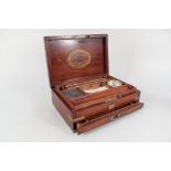 A Victorian mahogany 'campaign' paint box with fitted interior by Reeves & Sons London,