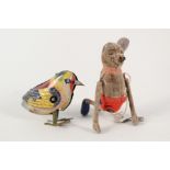 An early felt clockwork mouse plus a Japanese tin plate clockwork bird