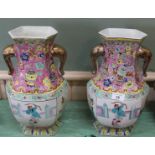 A pair of modern Chinese polychrome figure and floral vases,