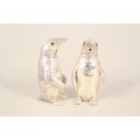 A pair of silver plated penguin cruets