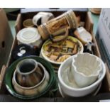 A box of various china including jelly moulds