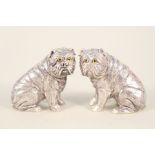 A pair of silver plated pug dog cruets