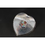 A cut glass silver lidded heart shaped pot with applied enamelled Fulham Town shield and inscribed