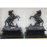 A pair of Victorian spelter Marli horses on black marble bases