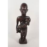 A Congo Kuba tribal maternity figure,