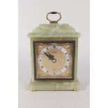 An Elliott onyx mantel clock,