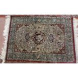 A silk floral prayer rug,