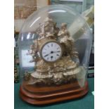 A gilt metal figure decorated mantel clock under glass dome,