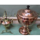 An Arts and Crafts copper and brass spirit kettle with stand and burner plus a large Victorian twin