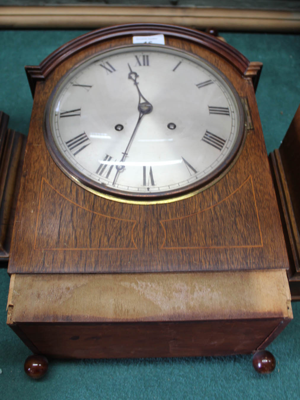 An inlaid mahogany bell strike mantel clock (case for restoration)