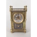 A French brass mantel clock with Maple & Co movement