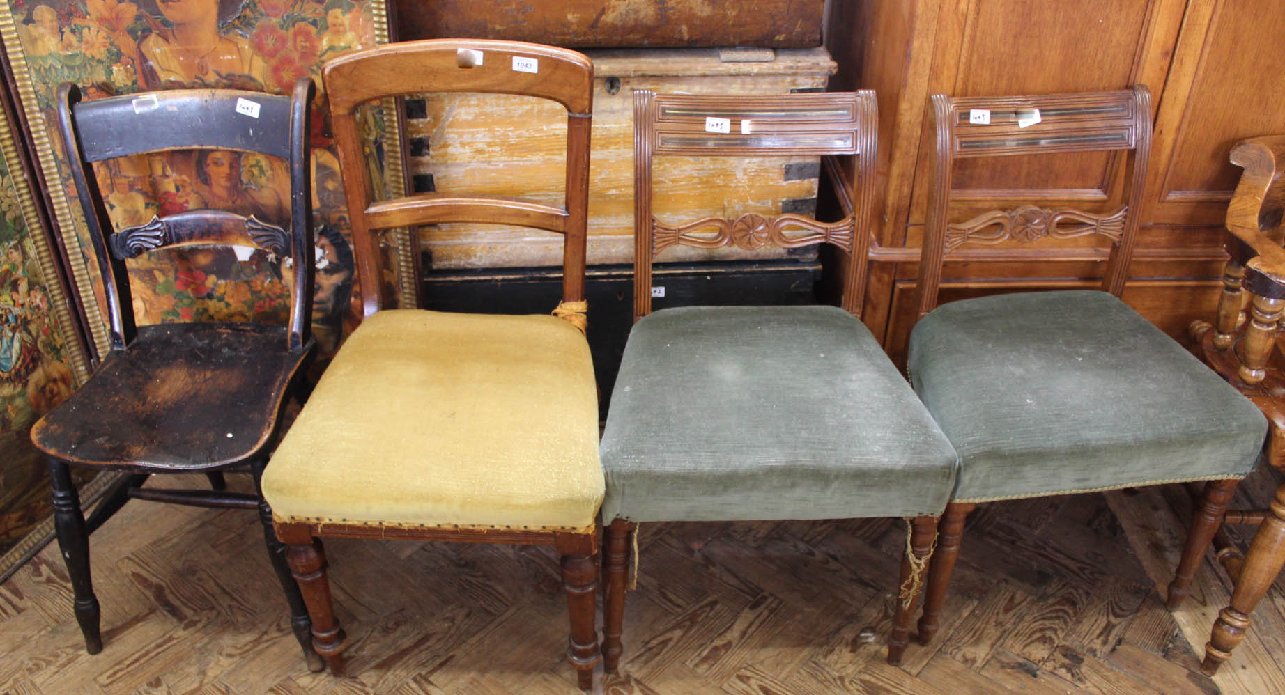 Four assorted mahogany and elm dining chairs