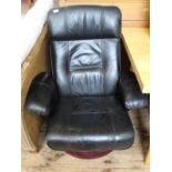 A black leather Stressless style reclining swivel chair