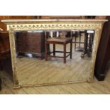 A Regency gilt overmantel mirror with bevelled glass