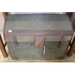 A vintage green canvas and leather bound travelling trunk