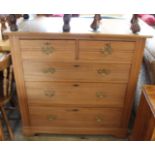 An Edwardian satinwood chest of five drawers