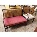 A 1920's rattan back double settee and an ebonised rattan single armchair