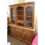 A modern pine glazed dresser