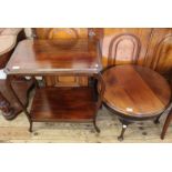 An Edwardian mahogany low round table and another Edwardian mahogany table