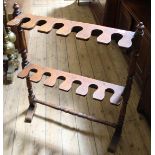 A Victorian mahogany riding boot stand