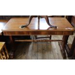 A Victorian mahogany stretcher table