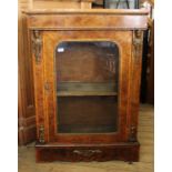 A 19th Century French burr walnut pier cabinet with gilt decoration