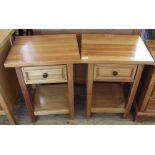 A pair of modern hardwood bedside tables with single drawers