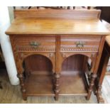 A pitch pine Arts and Crafts two drawer hall table