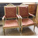 A pair of French gilt and plaster armchairs (as found)