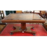 A Victorian leather topped coffee table with octagonal support